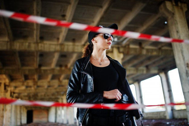 A federal investigator inside a warehouse