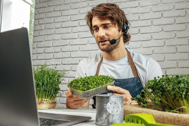 A man selling micro-greens online