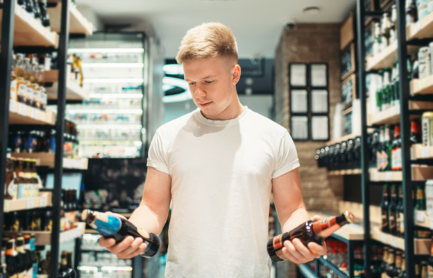 A man shopping for beer