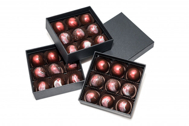 Chocolates in black boxes for good packaging