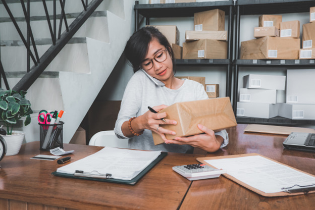 A food business owner calling a customer regarding a food shipment