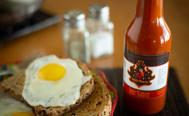 A white BOPP hot sauce label