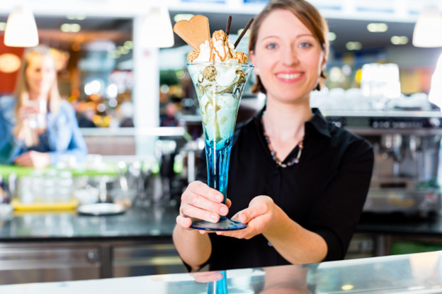 An ice cream seller offering a special sundae