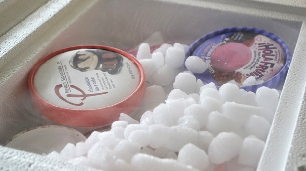 Transporting ice cream in an Styrofoam box containing dry ice