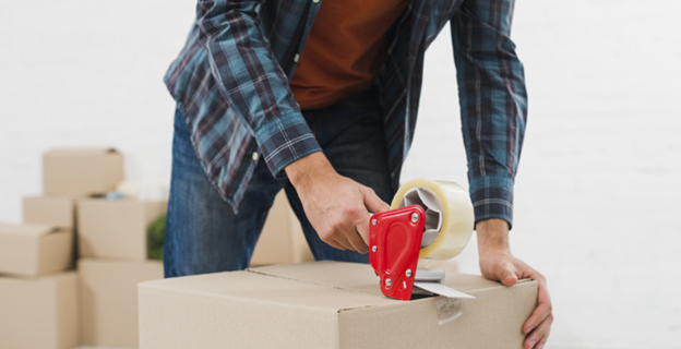 Closing a box with pressure-activate plastic packing tape