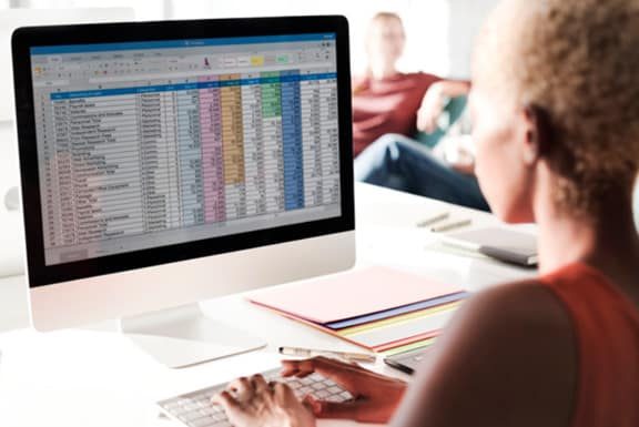 Woman-arranging-data-in-excel