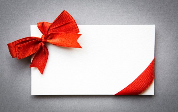 card-with-red-ribbons-bows