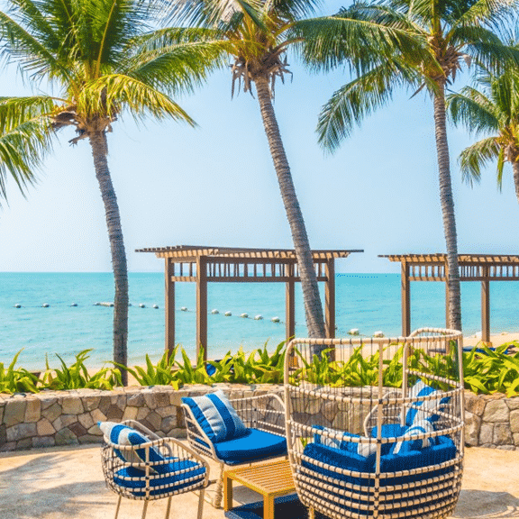 A palm beach garden with blue furnishings
