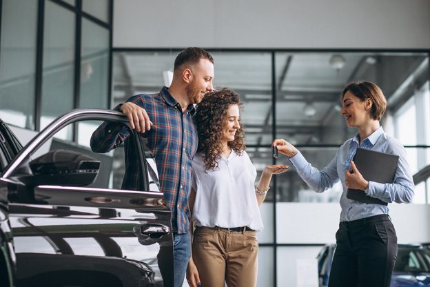 young-couple-choosing-car-car-show-room