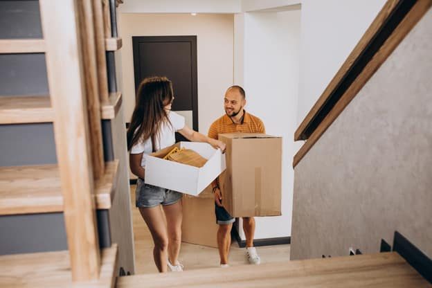 young-family-moving-into-their-new-house